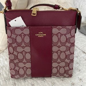 Burgundy coach crossbody